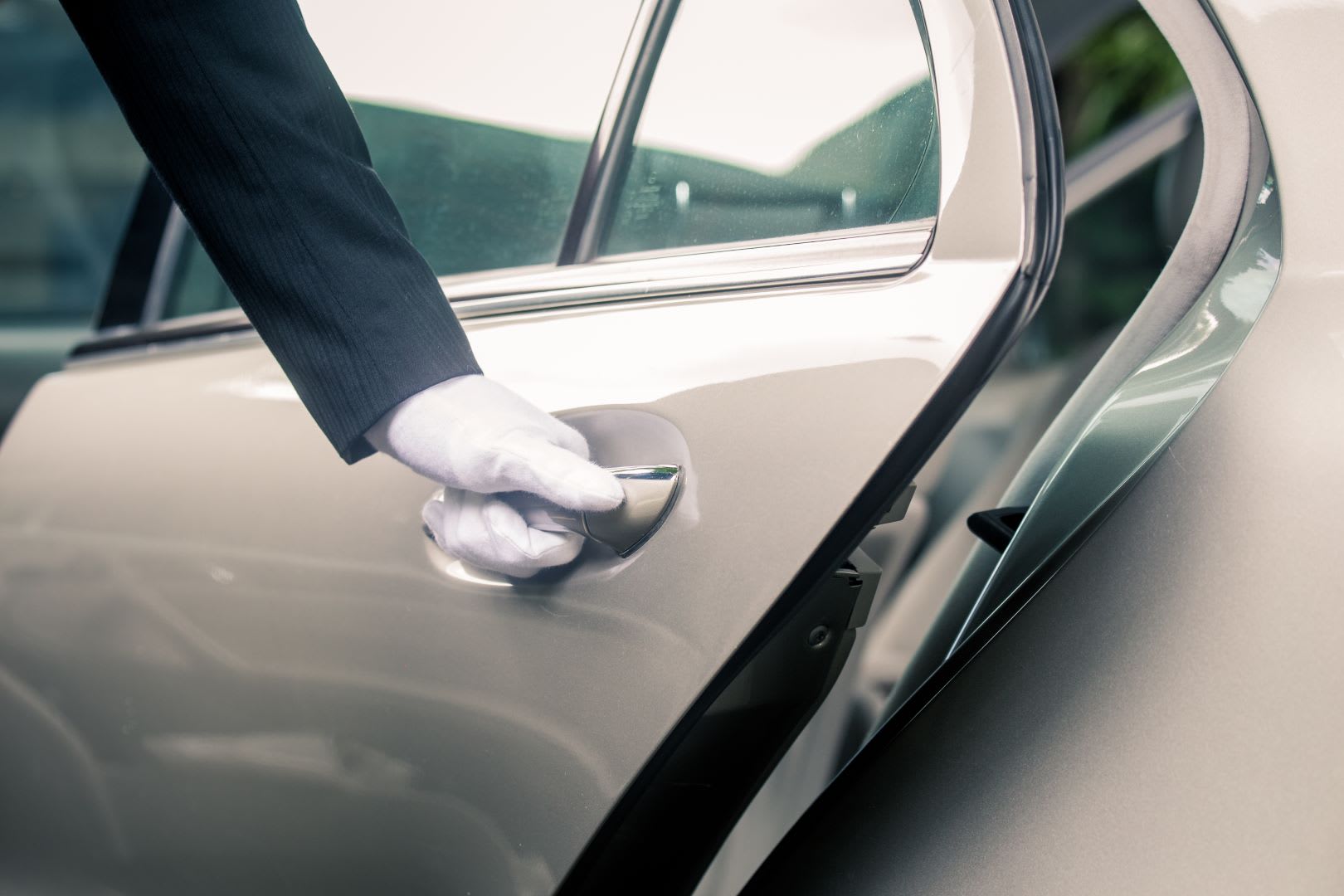 Passenger being collected by a Hobart taxi